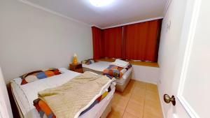 Postel nebo postele na pokoji v ubytování Altos de San Alfonso + 19 fotografií