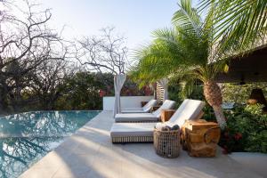 Bazén v ubytování Silvestre Nosara Hotel & Residences nebo v jeho okolí