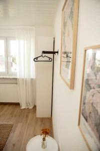 a bathroom with a white toilet in a room at DESIGN:Suite am Festspielhaus in Recklinghausen