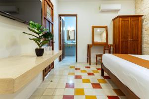 Ein Bett oder Betten in einem Zimmer der Unterkunft Hotel Boutique Casa Hipil