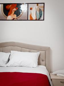 Postel nebo postele na pokoji v ubytování Guest House Ergest