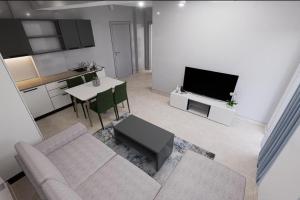 TV a/nebo společenská místnost v ubytování Split Rooftop Suites