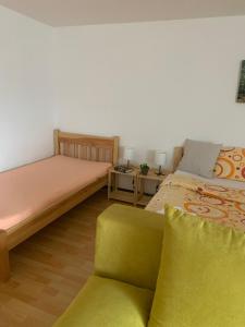 Postel nebo postele na pokoji v ubytování Penzion Pod pecí