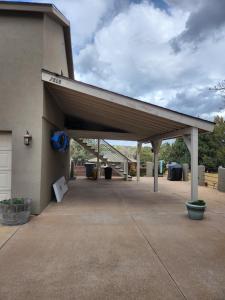 a building with awning on the side of it at Ronnie's Resort in Payson