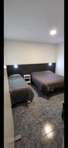Una cama o camas en una habitación de Complejo Sol del Velasco