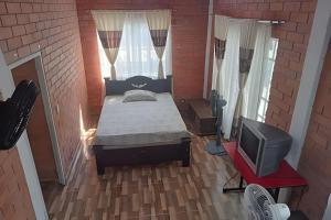 Et tv og/eller underholdning på Casa de verano con wifi, cocina completamente privada