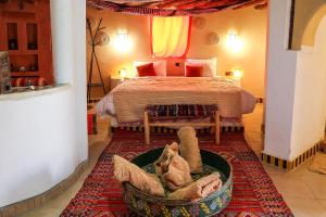 Postel nebo postele na pokoji v ubytování Dune House