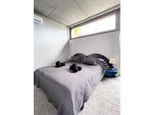 Ένα ή περισσότερα κρεβάτια σε δωμάτιο στο Apartment in La Punta de Tijarafe +29 φωτογραφίες