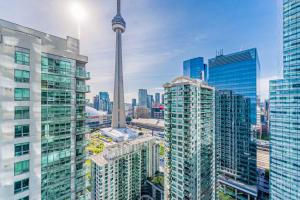 a view of the cn tower in a city at Downtown Apartments 3 in Toronto