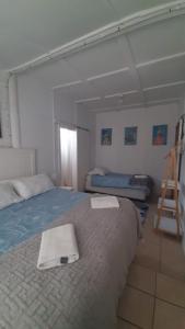 Ein Bett oder Betten in einem Zimmer der Unterkunft Alhoa Halfway Stop