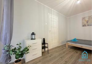 Posteľ alebo postele v izbe v ubytovaní Spacious Room - Peaceful Retreat, 2 Minutes to Gdańsk Old Town