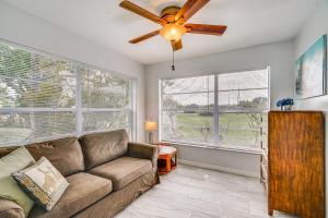 a living room with a couch and a ceiling fan at Newly Remodeled Home Less Than 2 Mi to Punta Gorda Airport in Punta Gorda