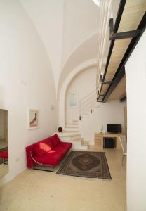 Ένα ή περισσότερα κρεβάτια σε δωμάτιο στο Relais Carlo V - Palazzo Storico