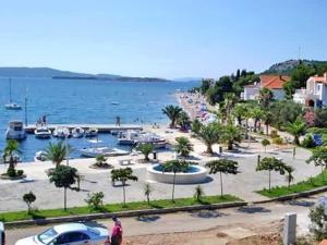 a view of a marina with boats in the water at Apartments Govic in Zaboric
