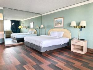 Tempat tidur dalam kamar di Hospitality House Union City US 51, TN