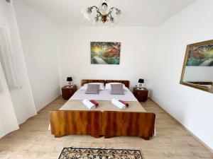 Postel nebo postele na pokoji v ubytování Apartman Barićevi dvori