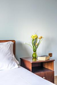 Кровать или кровати в номере Romeo Seaside Luxury Suite