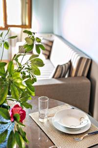 Гостиная зона в Romeo Seaside Luxury Suite