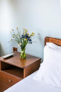 Кровать или кровати в номере Romeo Seaside Luxury Suite