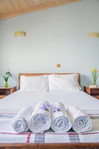 Кровать или кровати в номере Romeo Seaside Luxury Suite