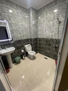 Kylpyhuone majoituspaikassa Jada Gzenaya