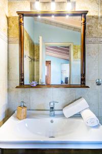 Ванная комната в Romeo Seaside Luxury Suite