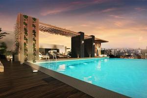 una grande piscina in cima a un edificio di Elegant 1BR in San Isidro / Pool a Lima