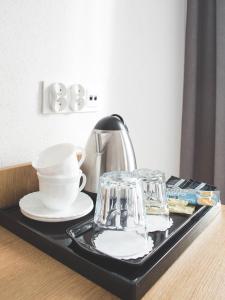 Zestaw do parzenia kawy i herbaty w obiekcie Hotel Beskidian