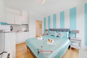 Letto o letti in una camera di Tiffany's Studio - Lugano in Style -By EasyLife Swiss