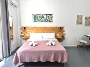 A bed or beds in a room at Marilù