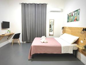 A bed or beds in a room at Marilù