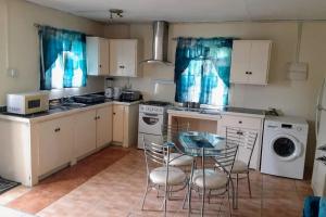Cucina o angolo cottura di The Cupid Chalet