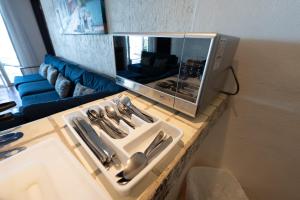 TV a/nebo společenská místnost v ubytování The Hacienda at Del Mar PV