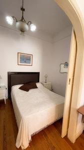 Postel nebo postele na pokoji v ubytování La Plata Housing II