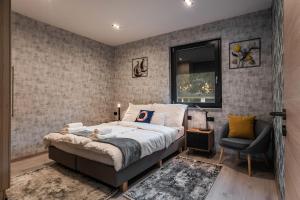 Postel nebo postele na pokoji v ubytování Duna Rév Apartman + 35 fotografií