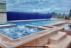Bazén v ubytování Departamento Coral Vía a Data nebo v jeho okolí