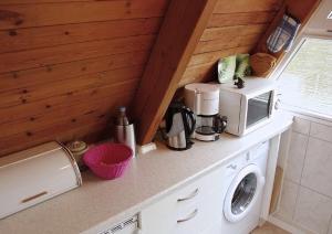 Kuchyň nebo kuchyňský kout v ubytování Ferienhaus Seestern