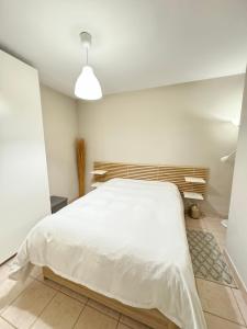 Postel nebo postele na pokoji v ubytování Beach Flat Albir,Esmeralda