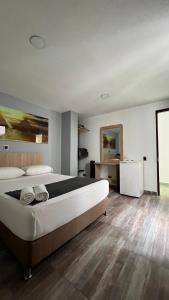 Postel nebo postele na pokoji v ubytování Hotel Gran Conquistador 33
