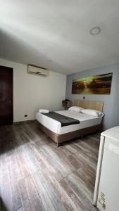Postel nebo postele na pokoji v ubytování Hotel Gran Conquistador 33