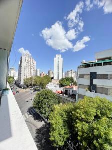 a view of a city from a balcony at La Plata Housing I in La Plata