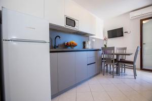Kuchyň nebo kuchyňský kout v ubytování Apartments Marija
