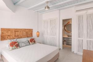 Cama ou camas em um quarto em Villa Konstantin Rooms & Suites