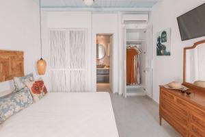 Cama ou camas em um quarto em Villa Konstantin Rooms & Suites