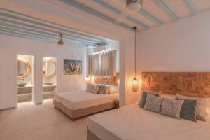 Cama ou camas em um quarto em Villa Konstantin Rooms & Suites