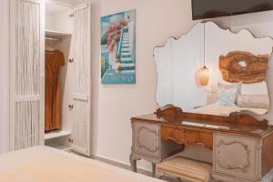 Cama ou camas em um quarto em Villa Konstantin Rooms & Suites