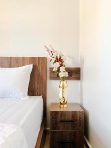 Uma cama ou camas num quarto em Hotel Ahmed Ali