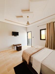 Uma cama ou camas num quarto em Hotel Ahmed Ali
