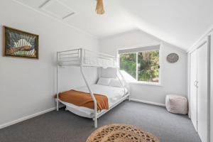 Ένα ή περισσότερα κρεβάτια σε δωμάτιο στο The Lake Hideaway on Kendall