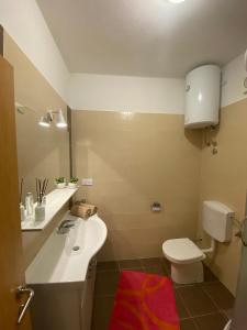 Et badeværelse på Seaside holiday house Postira, Brac - 22663